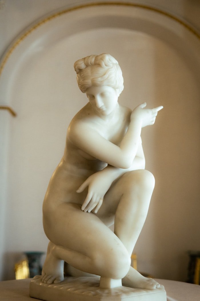 Marble kneeling classical sculpture
