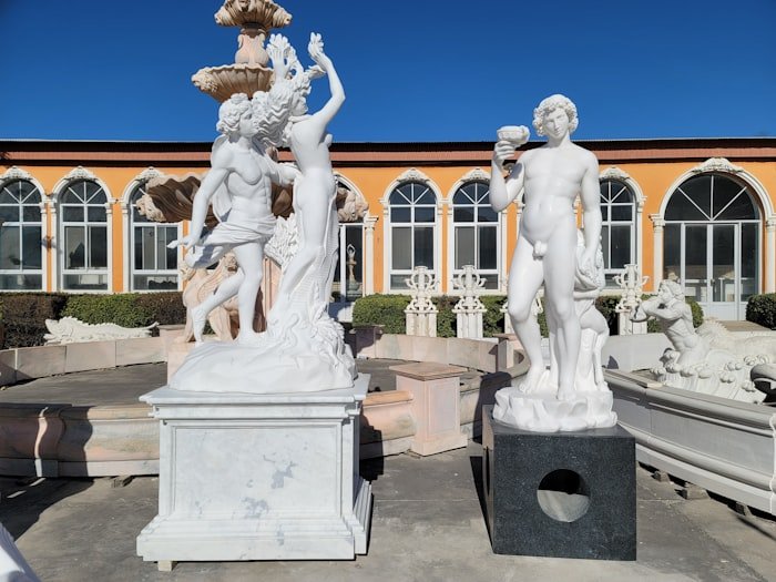 Classical white marble sculptures group